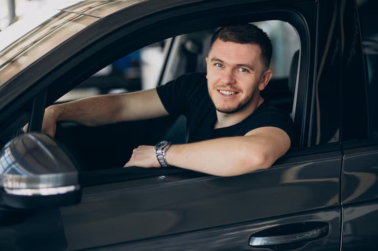 files/handsome-man-sitting-car-testing-it_1303-21797_jpg.avif